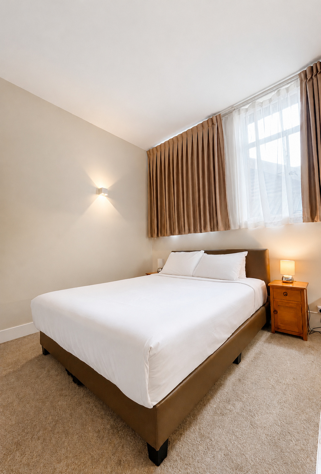 Standard Double | Bed detail and bedside lighting