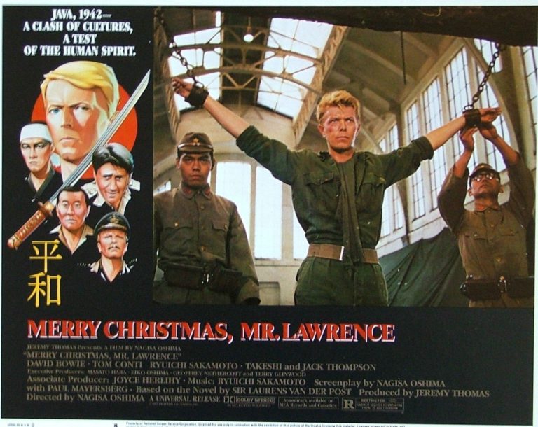 Lobby card for Merry Christmas, Mr. Lawrence featuring David Bowie inside the former Auckland Railway Station.