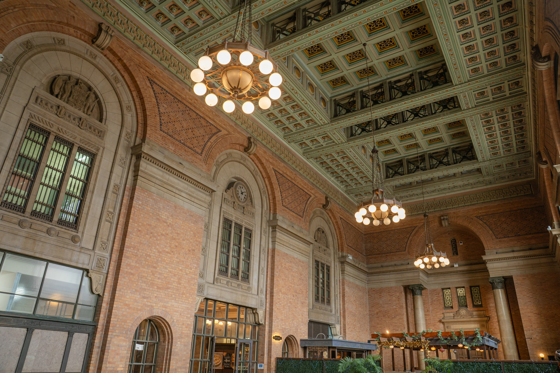 The Grand Hall's brick arches, chandeliers and ornate heritage ceiling.