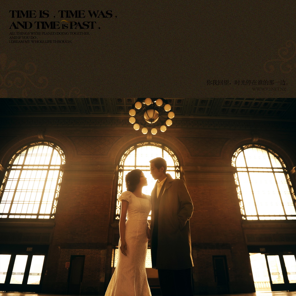 A fashion portrait beneath the arched windows of the Grand Hall.