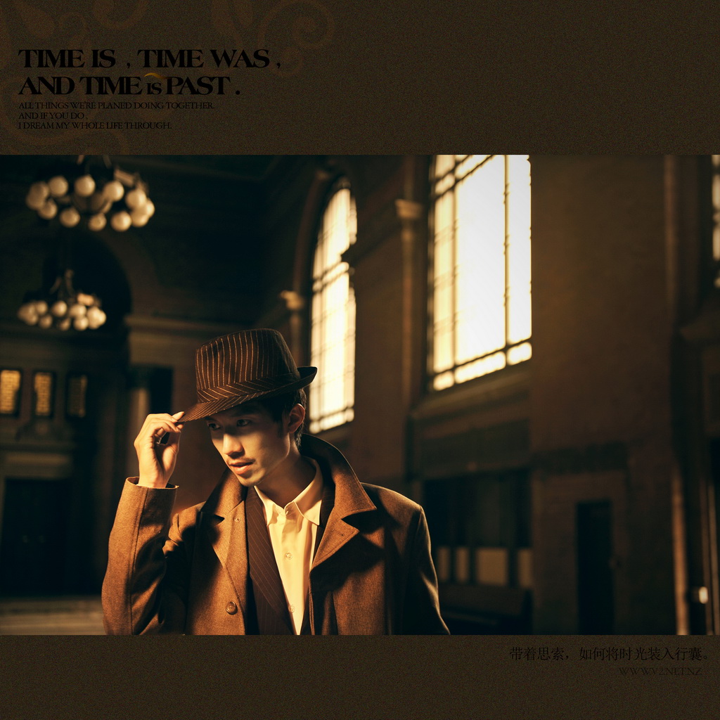 A cinematic portrait beneath the chandeliers and tall windows of the Grand Hall.